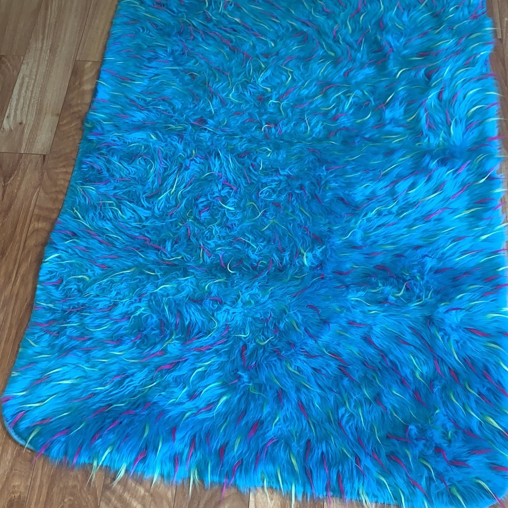 57” x 35 1/2” rug, very good used condition.